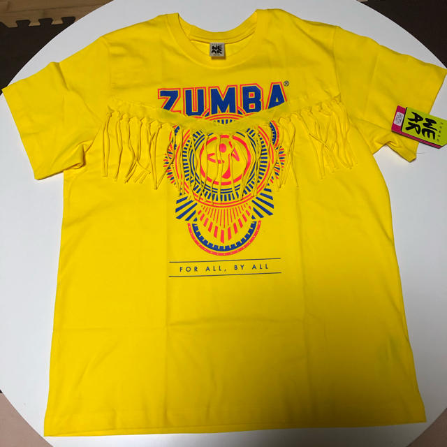 Zumba(ズンバ)の【新品・未使用品】ZUMBA®︎ウェア　Ｔシャツ　黄色 スポーツ/アウトドアのスポーツ/アウトドア その他(ダンス/バレエ)の商品写真