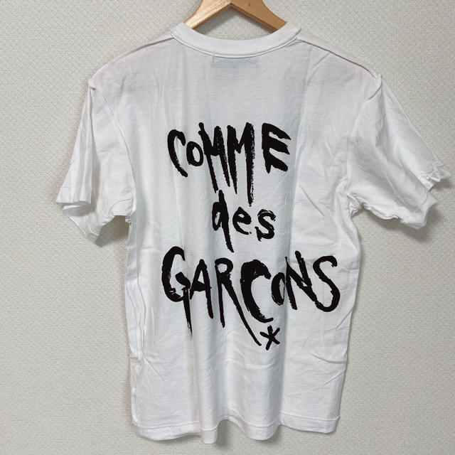 BLACK COMME des GARCONS(ブラックコムデギャルソン)のCOMME des GARCONS コムデギャルソン ブラックマーケットTシャツ メンズのトップス(Tシャツ/カットソー(半袖/袖なし))の商品写真