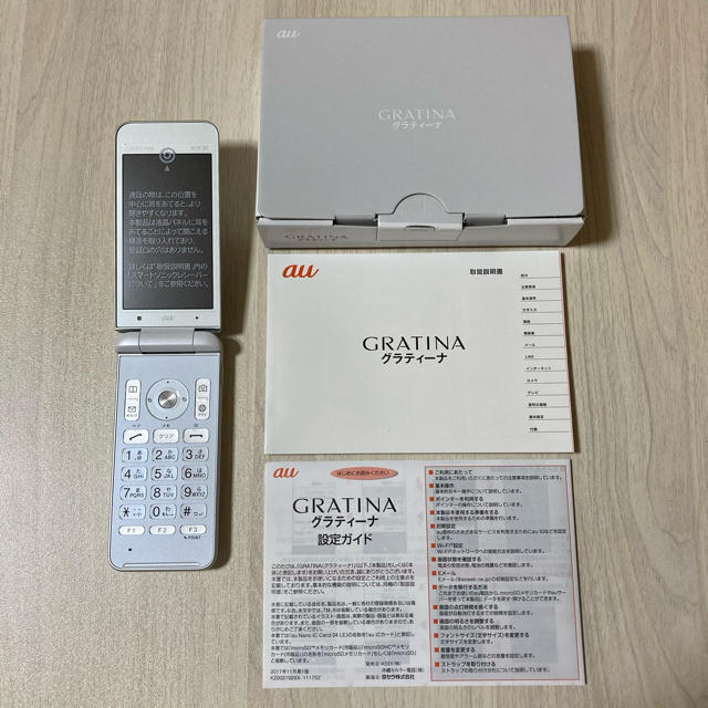 au(エーユー)のGRATINA KYF37SWA WHITE 新品未使用　SIMロック解除済み スマホ/家電/カメラのスマートフォン/携帯電話(携帯電話本体)の商品写真