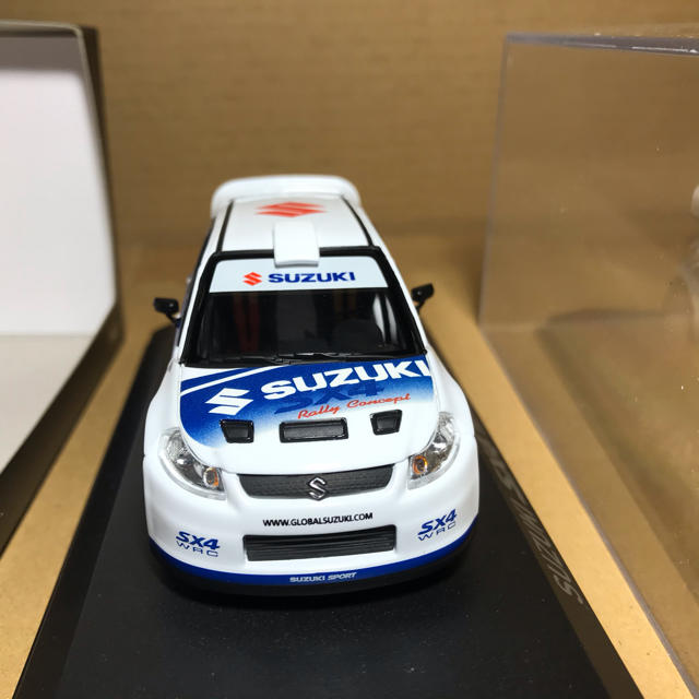 スズキ(スズキ)のノレブ　1/43 スズキ　SX4 WRC コンセプト　ラリーカー　ミニカー エンタメ/ホビーのおもちゃ/ぬいぐるみ(ミニカー)の商品写真