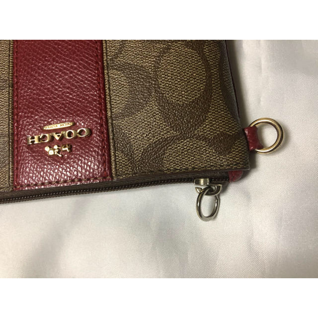 COACH(コーチ)の【coach】ポーチ　シグネシチャー柄　赤　革製 レディースのファッション小物(ポーチ)の商品写真