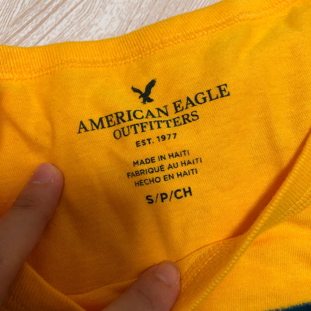 American Eagle(アメリカンイーグル)のアメリカンイーグル　イエロー　オレンジ　Tシャツ　 メンズのトップス(Tシャツ/カットソー(半袖/袖なし))の商品写真