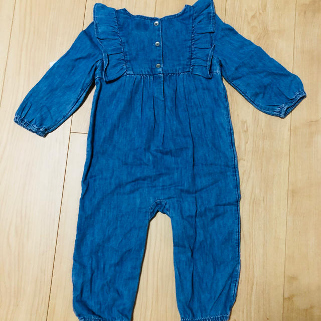 GAP(ギャップ)のbaby GAP 新品フリルデニム　ロンパース　オーバーオール  キッズ/ベビー/マタニティのベビー服(~85cm)(ロンパース)の商品写真