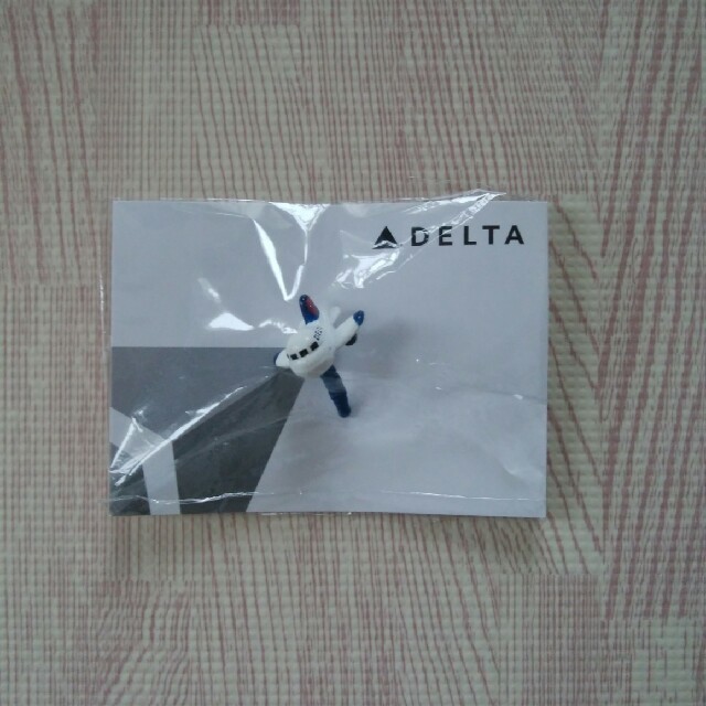 DELTA(デルタ)のデルタ航空　イヤーホンキャップ エンタメ/ホビーのコレクション(ノベルティグッズ)の商品写真