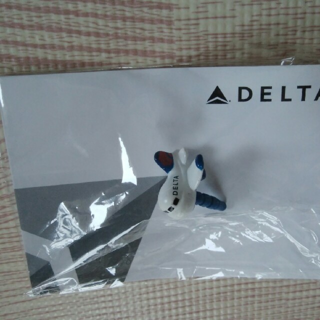 DELTA(デルタ)のデルタ航空　イヤーホンキャップ エンタメ/ホビーのコレクション(ノベルティグッズ)の商品写真