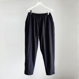 コモリ(COMOLI)のCOMOLI NYLON TRACK PANTS NAVY(その他)