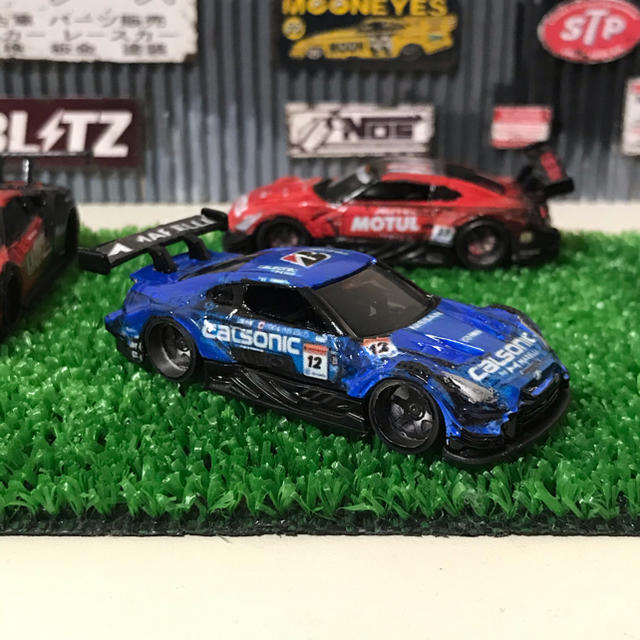 Takara Tomy(タカラトミー)のトミカ　カスタム　スーパーGT カルソニックGT-R ホットウィール  ミニカー エンタメ/ホビーのおもちゃ/ぬいぐるみ(ミニカー)の商品写真