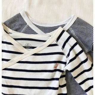 プチバトー(PETIT BATEAU)のPETIT BATEAU とスヌーピー　　長袖ロンパース(ロンパース)