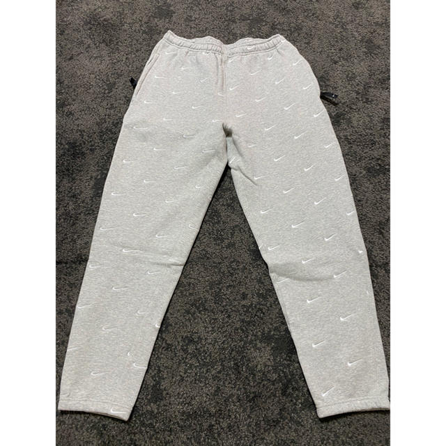 メンズNIKE All Over Swoosh Logo Pants