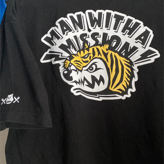 マンウィズアミッション(MAN WITH A MISSION)の【古着】マンウィズ　タイガースコラボ　Tシャツ XLサイズ(Tシャツ/カットソー(半袖/袖なし))