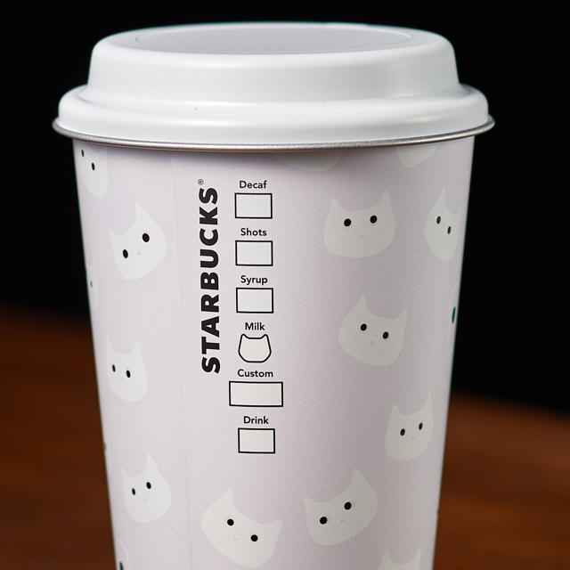 Starbucks Coffee(スターバックスコーヒー)のスターバックス☆白と黒缶セット！中身なし、ハロウィン限定缶 インテリア/住まい/日用品のキッチン/食器(容器)の商品写真