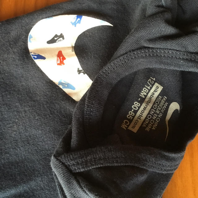 NIKE(ナイキ)の中古　ベビー　Nike ロンパース  紺色　80 キッズ/ベビー/マタニティのベビー服(~85cm)(ロンパース)の商品写真