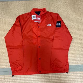 ザノースフェイス(THE NORTH FACE)のTHE NORTH FACE コーチジャケット ファイアリーレッドM 新品(ナイロンジャケット)