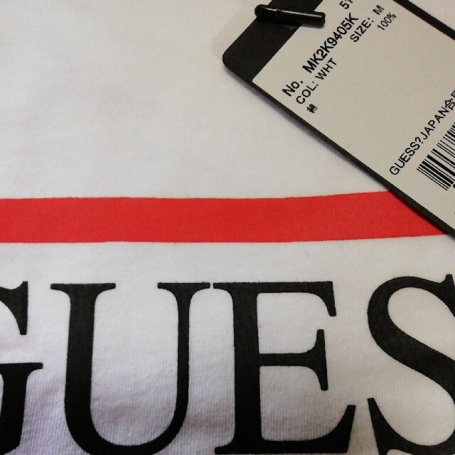 GUESS(ゲス)のゲスGUESS　ユニセ　M白半袖 レディースのトップス(Tシャツ(半袖/袖なし))の商品写真