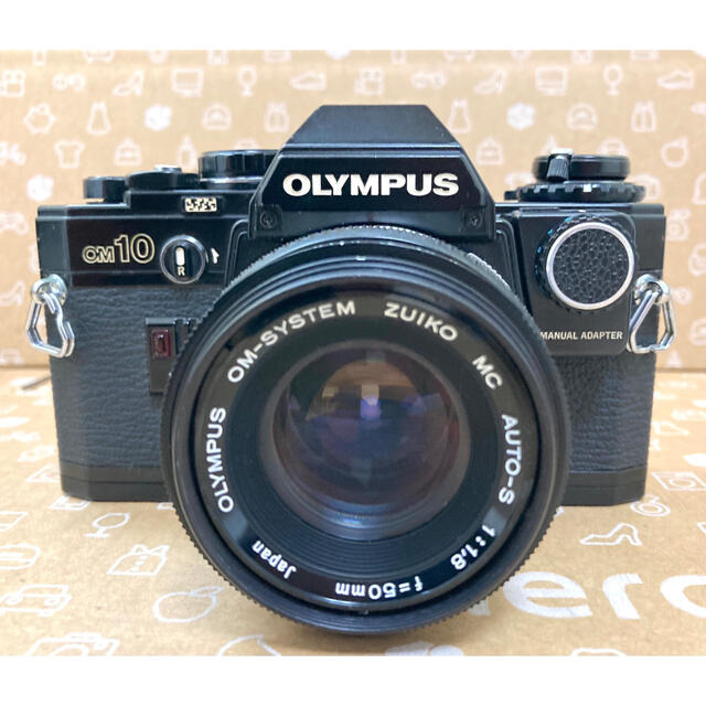 OLYMPUS(オリンパス)のOLYMPUS OM-10 レンズ  マニュアルアダプター 付き 動作品 黒 スマホ/家電/カメラのカメラ(フィルムカメラ)の商品写真