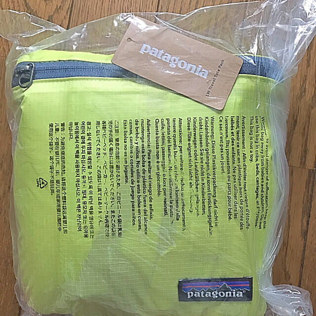 patagonia(パタゴニア)の送料無料パタゴニア新品トートバックきみどりトラベルザック折り畳みリュックかばん メンズのバッグ(バッグパック/リュック)の商品写真