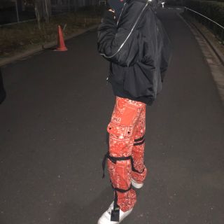 オフホワイト(OFF-WHITE)のROGIC revenge galleryボンテージカーゴパンツ オレンジ(ワークパンツ/カーゴパンツ)