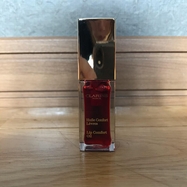 CLARINS(クラランス)の定価3520円★クラランス コンフォート リップオイル 03：レッドベリー コスメ/美容のベースメイク/化粧品(リップグロス)の商品写真