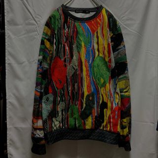 クージー(COOGI)の古着　総柄　モックネック　3Dニット　プリント　裏起毛　スウェット(スウェット)