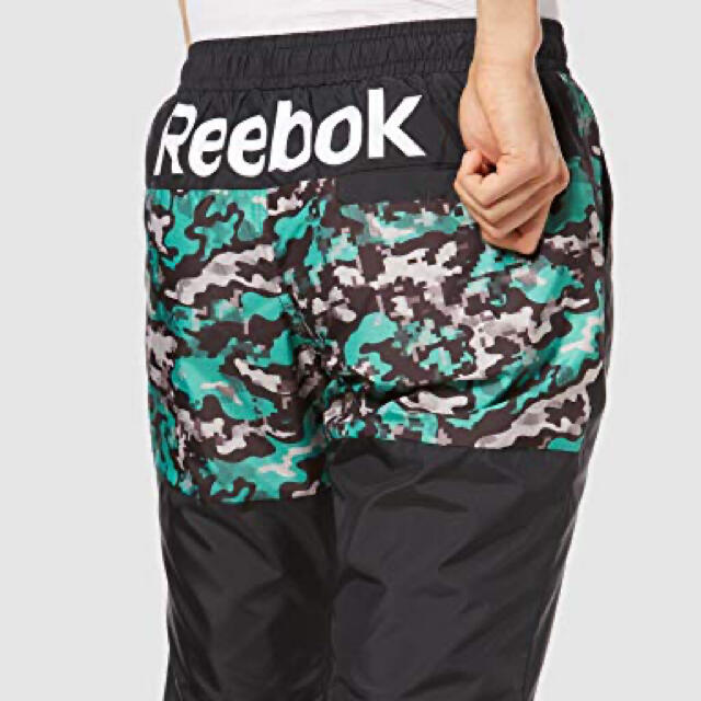 Reebok(リーボック)のリーボック L トレーニングウェア ワンシリーズ カモウインドパンツ メンズのトップス(ジャージ)の商品写真