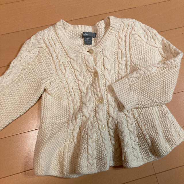 GAP(ギャップ)のbaby GAP ニットカーディガン　アイボリー　裾フリル　90 キッズ/ベビー/マタニティのキッズ服女の子用(90cm~)(カーディガン)の商品写真