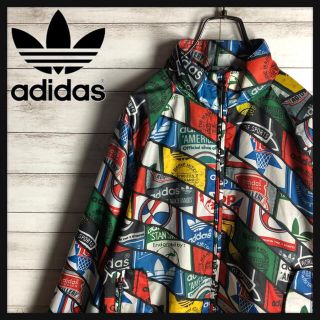 アディダス(adidas)の【希少デザイン】アディダス☆ナイロンジャケット 総柄 マルチカラー(ナイロンジャケット)