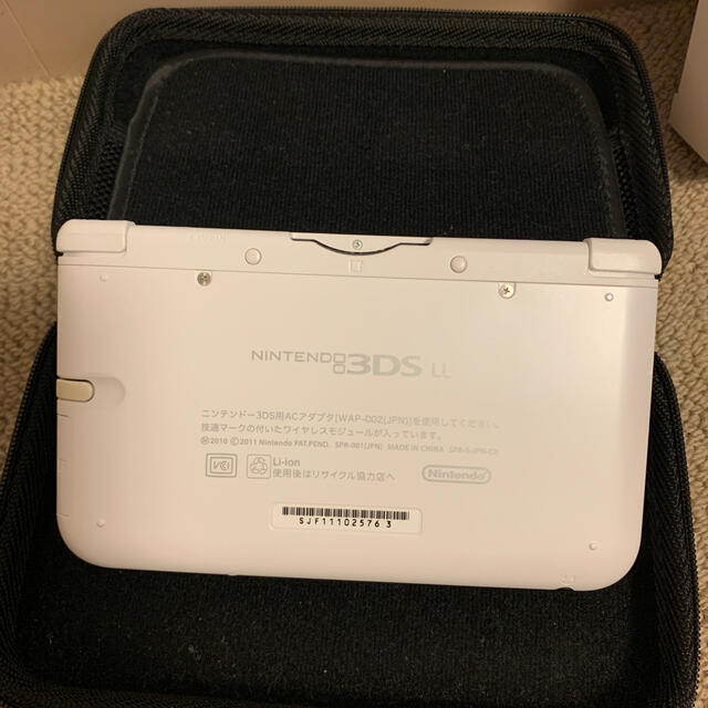 ニンテンドー3DS(ニンテンドー3DS)の【中古】Nintendo 3DS  LL 本体 ホワイト - 純正ACアダプタ付 エンタメ/ホビーのゲームソフト/ゲーム機本体(携帯用ゲーム機本体)の商品写真