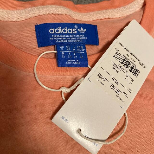 adidas(アディダス)のアディダス　サーモンピンクTシャツ レディースのトップス(Tシャツ(半袖/袖なし))の商品写真