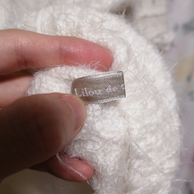 白ニット　袖フリル レディースのトップス(ニット/セーター)の商品写真