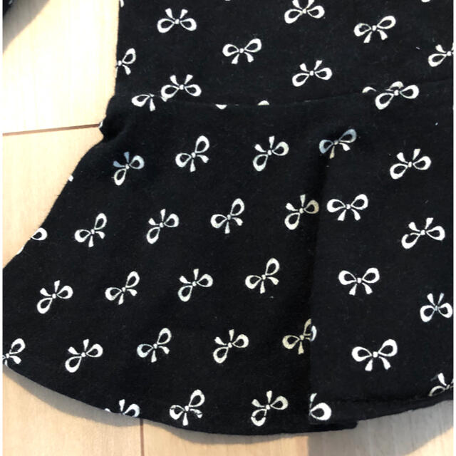 babyGAP(ベビーギャップ)の美品　ベビーギャップ　女の子　リボン柄フレアフリルトップス　90ｾﾝﾁ キッズ/ベビー/マタニティのキッズ服女の子用(90cm~)(Tシャツ/カットソー)の商品写真