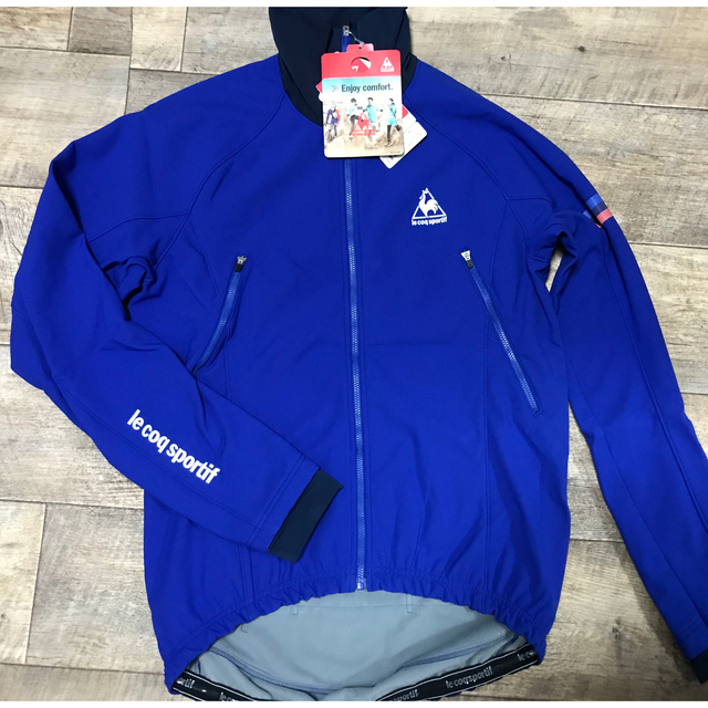 le coq sportif(ルコックスポルティフ)の【新品　未使用】サイクルウェア　アウター　秋冬　L メンズ　ウエア　ロードバイク スポーツ/アウトドアの自転車(ウエア)の商品写真