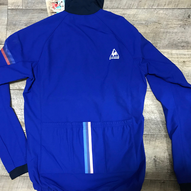 le coq sportif(ルコックスポルティフ)の【新品　未使用】サイクルウェア　アウター　秋冬　L メンズ　ウエア　ロードバイク スポーツ/アウトドアの自転車(ウエア)の商品写真