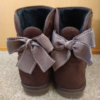 アグ(UGG)のバックリボンのボアブーツ  フェイクムートンブーツ  スウェードブーツ(ブーツ)