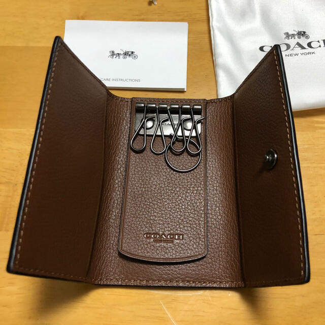 COACH(コーチ)の塩キャラメル様専用　COACH コーチ レザー 4連 リング キーケース レディースのファッション小物(キーケース)の商品写真