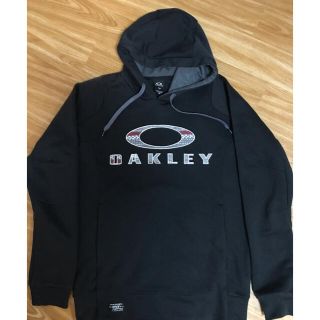 オークリー(Oakley)のOakley オークリー パーカー黒Ｌ　used(パーカー)