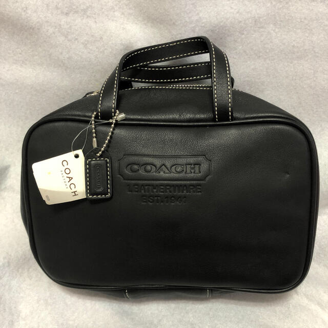 COACH(コーチ)のcoach コーチ　化粧ポーチ　タグ付き未使用　アメリカで購入　形崩れあり レディースのファッション小物(ポーチ)の商品写真