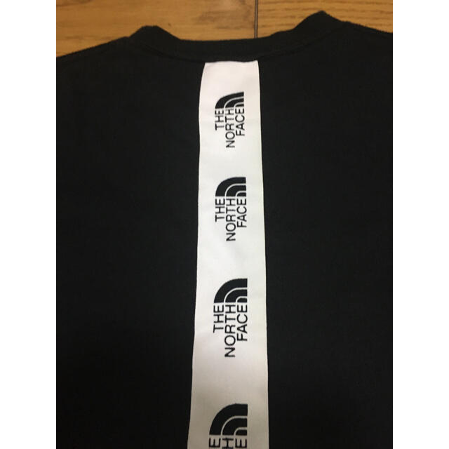 THE NORTH FACE(ザノースフェイス)の中古ノースフェイス黒ＴシャツＬロゴ多数バックプリント入り レディースのトップス(Tシャツ(半袖/袖なし))の商品写真