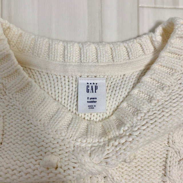 babyGAP(ベビーギャップ)のGap kids baby ホワイト ケーブル ニット キッズ/ベビー/マタニティのキッズ服女の子用(90cm~)(ニット)の商品写真