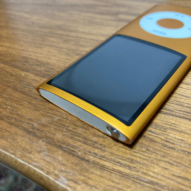 Apple(アップル)のiPod nano(第4世代) 8GB オレンジ スピーカー付 動作確認済 スマホ/家電/カメラのオーディオ機器(ポータブルプレーヤー)の商品写真