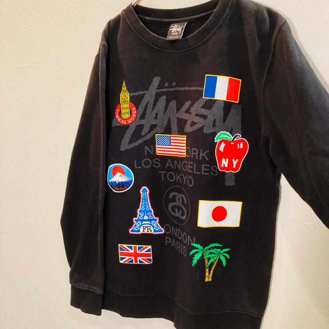 ステューシー stussy スウェット 黒 S 国旗 裏起毛 ワールドツアー