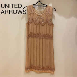 ユナイテッドアローズ(UNITED ARROWS)のビジューワンピースドレス　ピンクベージュ(ミディアムドレス)
