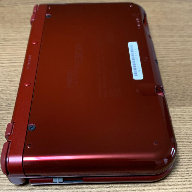 ニンテンドー3DS(ニンテンドー3DS)のNEW Nintendo 3DS LL  メタリックレッド　本体➕おまけつき エンタメ/ホビーのゲームソフト/ゲーム機本体(携帯用ゲーム機本体)の商品写真