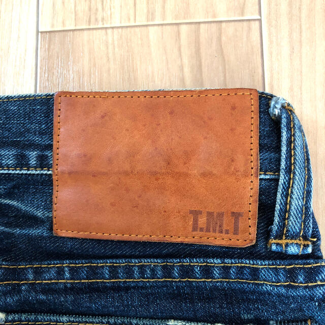 TMT(ティーエムティー)の【SALE】TMT クラッシュ　パンツ　ワッペン　デニム メンズのパンツ(デニム/ジーンズ)の商品写真