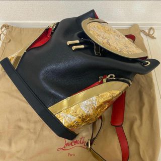 クリスチャンルブタン(Christian Louboutin)のクリスチャンルブタンChristian Louboutin リュック ゴールド(バッグパック/リュック)