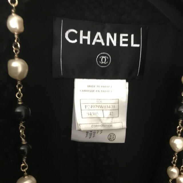 CHANEL(シャネル)のシャネル　スーツ黒42 レディースのレディース その他(セット/コーデ)の商品写真