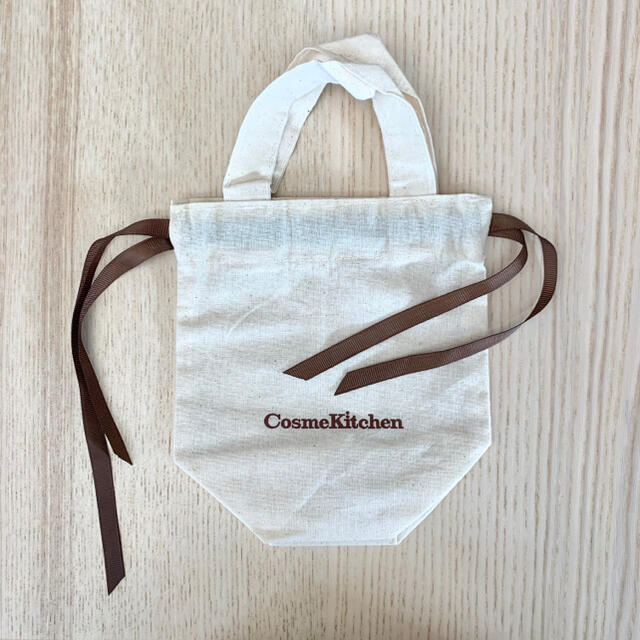 Cosme Kitchen(コスメキッチン)の新品未使用⭐︎cosme kitchen 巾着　Sサイズ レディースのバッグ(ショップ袋)の商品写真