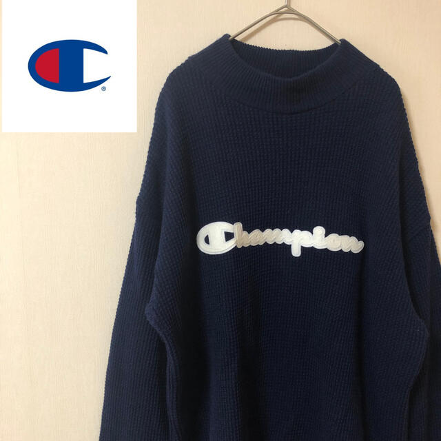 Champion(チャンピオン)の【古着女子必見♪】チャンピオン 胸元ワッペンビッグロゴ 紺色 ニットセーター メンズのトップス(ニット/セーター)の商品写真