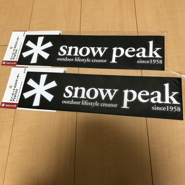 Snow Peak(スノーピーク)のスノーピーク ロゴ ステッカー アスタリスクの仕様 2枚セット スポーツ/アウトドアのアウトドア(その他)の商品写真