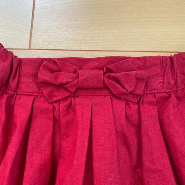 3can4on(サンカンシオン)の3can4on リボン付きスカート 赤 100cm キッズ/ベビー/マタニティのキッズ服女の子用(90cm~)(スカート)の商品写真