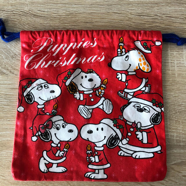 SNOOPY(スヌーピー)のUSJ購入　SNOOPY巾着　クリスマス エンタメ/ホビーのおもちゃ/ぬいぐるみ(キャラクターグッズ)の商品写真